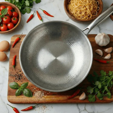 Titanium hammered wok pan with non-stick pure titanium surface and stainless steel handle, suitable for induction and gas cooktops top view